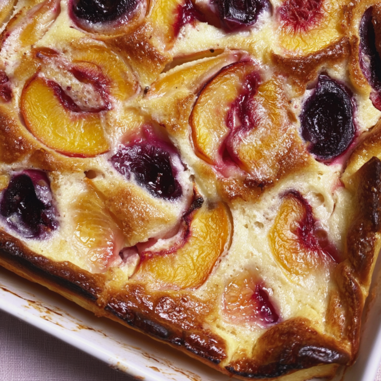 Cardamom and Stone Fruit Clafoutis with fresh seasonal fruit and creamy baked cu