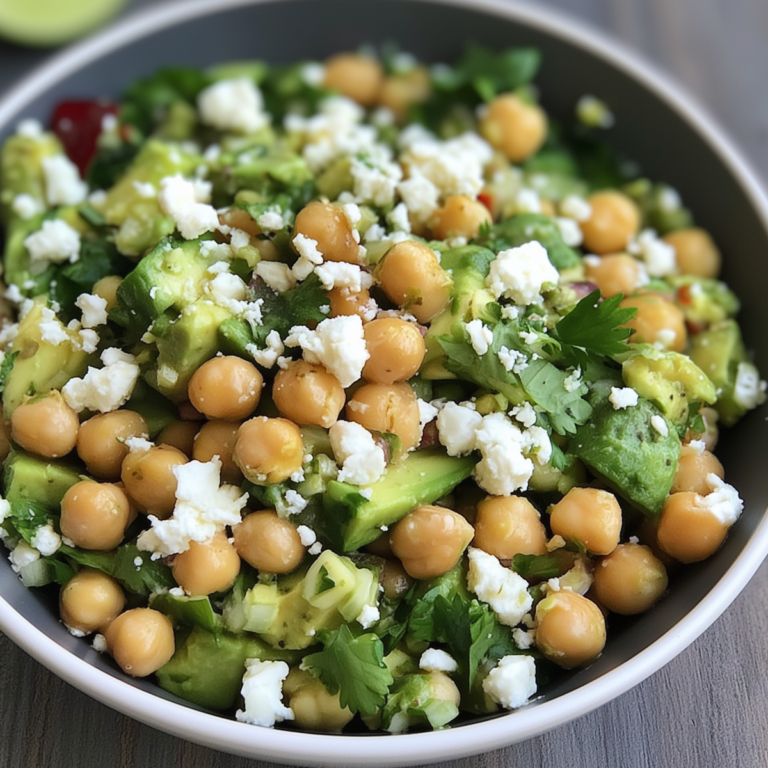 Chopped Salad with chickpeas, avocado, feta cheese, cilantro, and fresh lime dressing