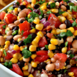 Colorful homemade Cowboy Caviar recipe served with tortilla chips