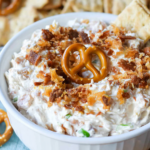Crack Pretzel Dip with bacon, cheddar cheese, and pretzels