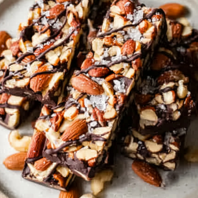 Dark Chocolate and Sea Salt Nut Bars with crunchy nuts and sea salt topping