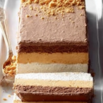 Frozen Chocolate Peanut Butter Terrine sliced and served on a dessert plate