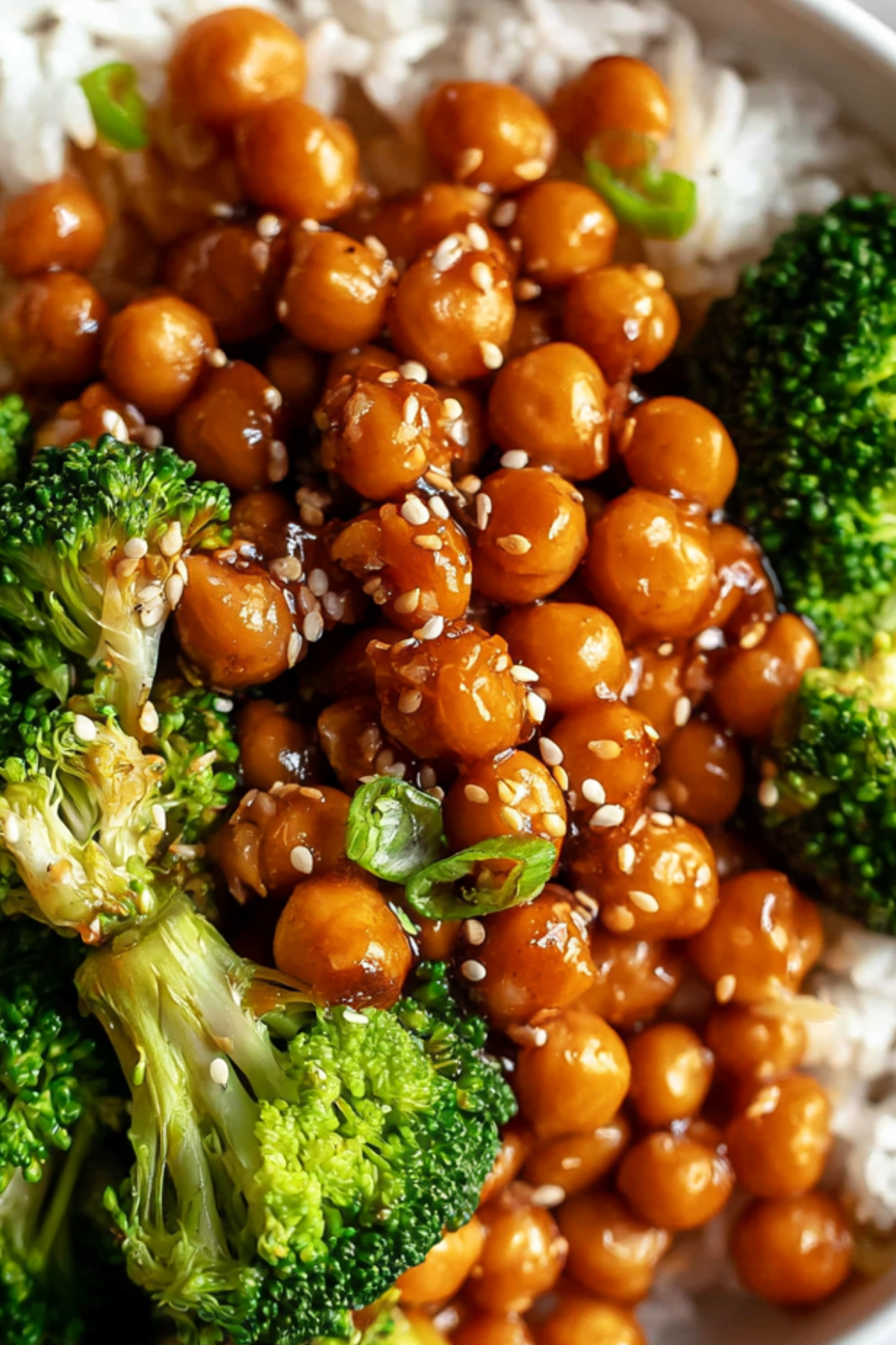 Sticky Chickpeas and Broccoli with sesame sauce served over rice
